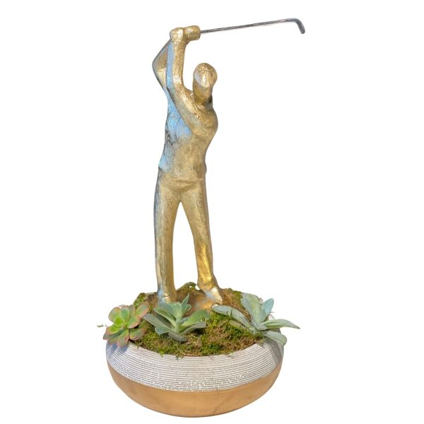 golfer statue and sheet grass