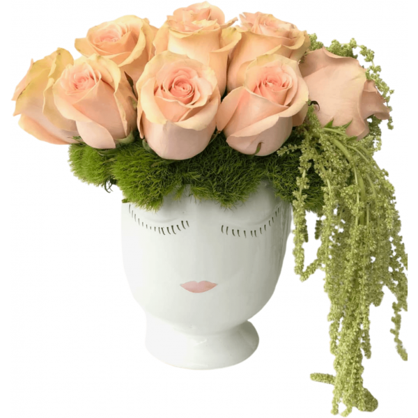 lady face vase full of roses